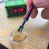 Close up using Rainbow MiniNail Multi-tip Dabber and Carb Cap Interchangeable Scoop Tip