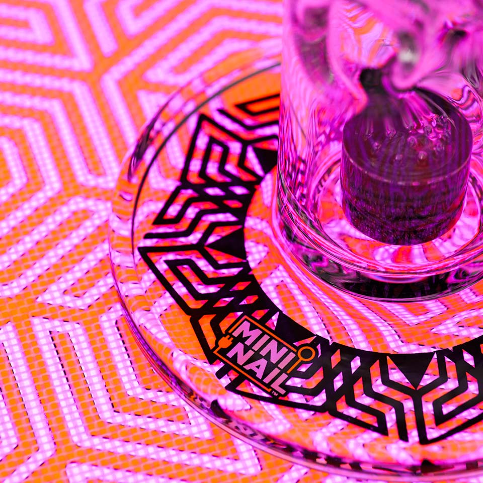 Closeup of MiniNail Multi-Color Backlit SlabPad Shown in Pink 