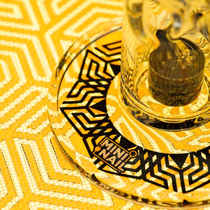 Closeup of MiniNail Multi-Color Backlit Slab Pad Shown in Yellow with Glass Rig