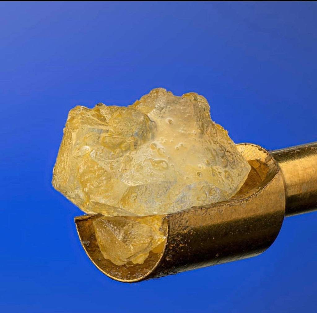 Close up diamond on Scoop tip of Rainbow MiniNail Multi-tip Dabber and Carb Cap